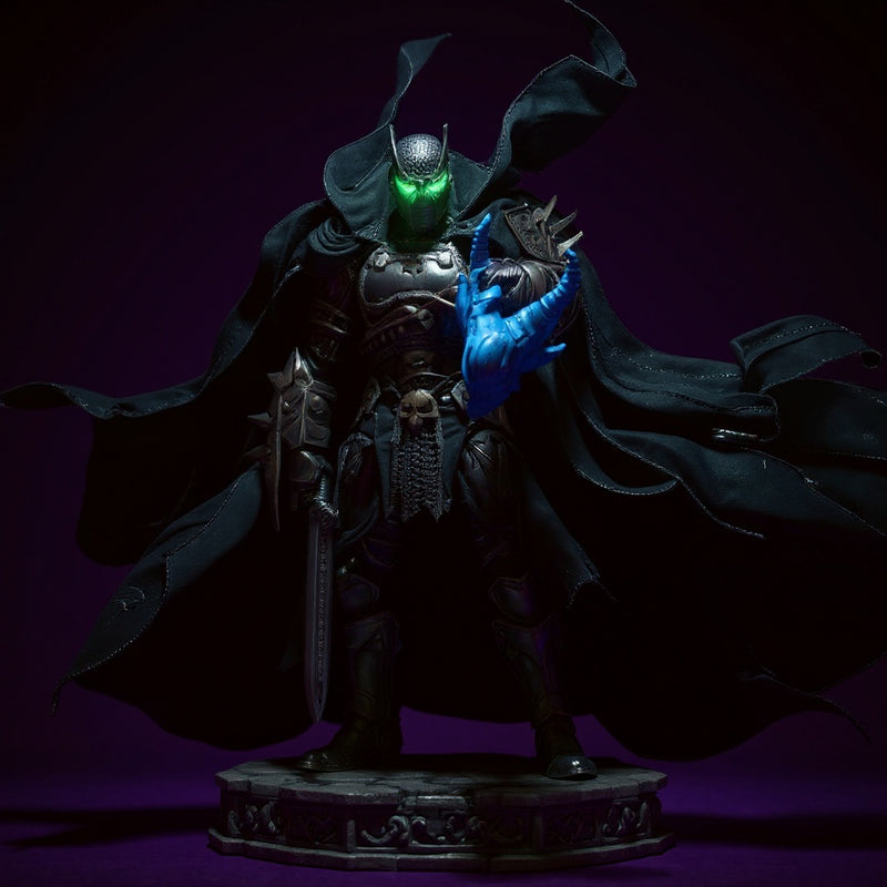 Hero image of a dark fabric cape with wire edges, posed dynamically on a medieval action figure against a bold violet gradient background.