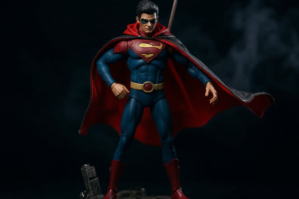 Dark flowing fabric cape with wire outline draped over action figure torso, dramatic windswept pose, gothic diorama backdrop with fog and ruined cityscape, dramatic side lighting.