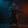 Matte black fabric trench coat with wire armature draped on a dark-armored Batman action figure on a rooftop, dramatic gradient sky background.