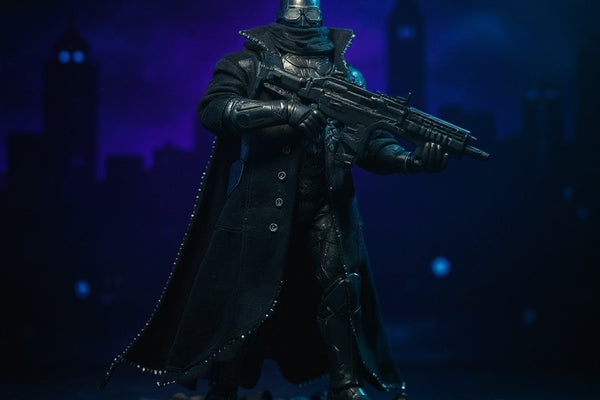 Wired action figure trench coat on Batman figure in gothic cityscape.