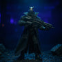 Black fabric trench coat with wire edges on Batman-style action figure on Gotham rooftop diorama, dramatic lighting.