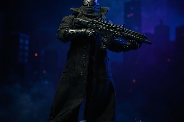 Matte black textured trench coat for 7-inch figure with wire-edged hem and collar, shown on diorama under dramatic lighting.