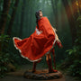 Shapeable wire fabric cape in deep red and tan draped on a 7-inch female warrior action figure, posed on rocky jungle diorama with spear and foliage.
