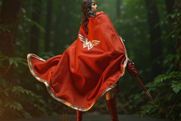 Soft goods cape on female warrior action figure in jungle diorama