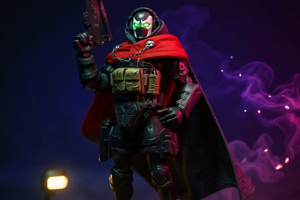 Tactical fabric cape on action figure on rooftop diorama with dramatic spotlight and fog.