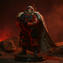 Dark red-black wired cape on a 7-inch figure in a hellscape diorama with red ambient lighting and rocky terrain.