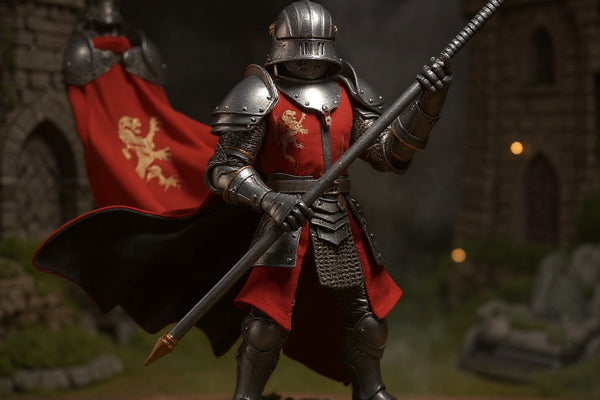 Red and black soft fabric cape on armored knight action figure in medieval castle diorama with LED lighting, sword and shield props