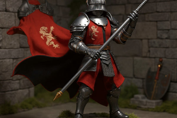 Flowing red and black wire-posable cloth cape on a 7-inch armored knight action figure, dynamic windswept pose, set against a medieval castle stone diorama with sword, shield, moss, fog, and LED-lit wooden base.