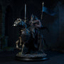 Dark tattered cloth cape with wire-shaped folds draped on a small articulated figure body, set against medieval castle ruins with sword, shield, fog, moonlit base, and banner.