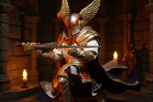 Dark fabric cape with dynamic folds displayed on a knight action figure against a dramatic castle backdrop.