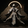 Fabric cape on action figure torso with castle backdrop and angel wings, dramatic lighting.