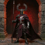 Handmade dark grey cloth cape on a medieval knight action figure against a crimson gradient backdrop with miniature castle props