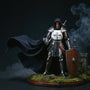 Flowing fabric cape with wire armature on armored knight action figure, dramatic castle diorama, deep blue and charcoal tones.