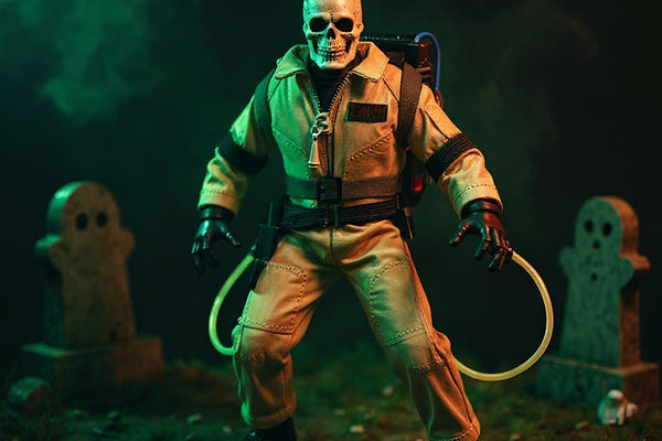 1/12 scale skeleton action figure wearing a handcrafted tan khaki jumpsuit with stitched patches and belt, posed dynamically in a foggy graveyard diorama with a ghost figurine, under dramatic lighting.