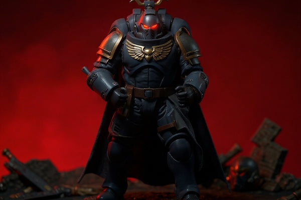 A 1/18 scale armored action figure torso wearing a custom fabric cape with wire-enhanced folds, posed on a ruined battlefield diorama with miniature weapons.