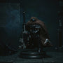 1/18 scale dark charcoal-black fabric cape with wire posing on action figure in gothic ruins scene.
