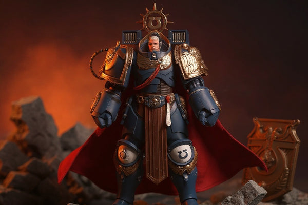 Deep red cape on action figure torso in a dramatic miniature battle diorama.