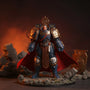 Deep red cape on action figure torso in a dramatic miniature battle diorama.