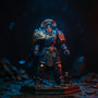 Small blue wired fabric cape for 1/18 Warhammer figure displayed on miniature ruins with bold blue-orange lighting.