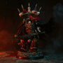 Tattered black fabric cape draped over miniature warhammer armor figure in dark stone ruins with dramatic red lighting.