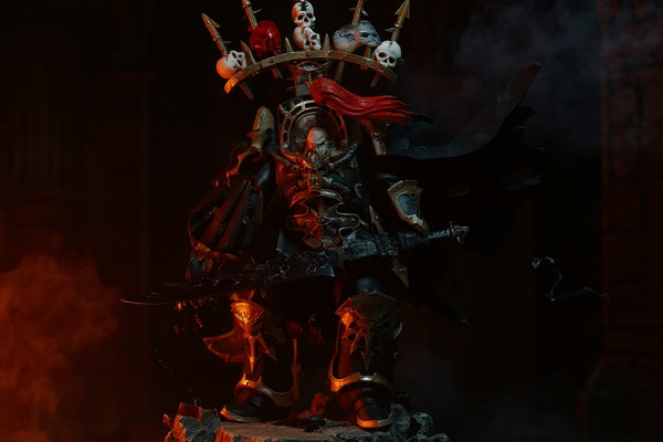Tattered black fabric cape with internal wire draped over a miniature armor figure in dark stone ruins with red-orange dramatic lighting
