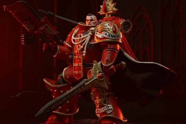 Posable crimson cloth cape on display stand with gothic ruins backdrop and dramatic red lighting
