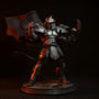 Black fabric cape on miniature Shredder figure against red and black ninja backdrop