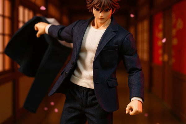 Miniature fabric school uniform on a posable action figure in a dramatic Japanese school hallway with cherry blossom decoration.