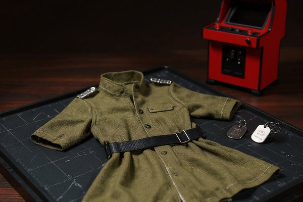 The Ralf Jones fabric outfit displayed on an arcade-themed arena diorama, surrounded by military props, under dramatic lighting.