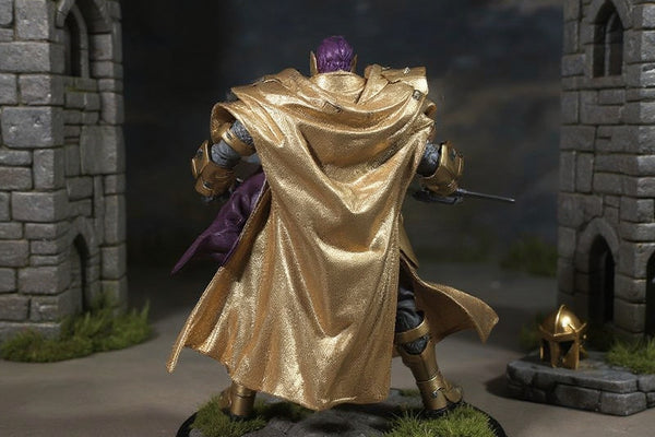 Flowing golden cloth cape on 1/72 knight action figure in stone castle diorama