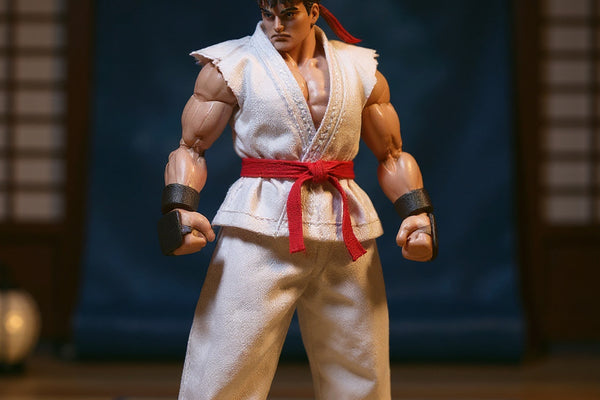 White karate gi with red belt posed in fighting stance on wooden dojo floor with paper lantern and training mat, bold blue gradient background.