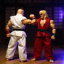 White karate gi with red trim on headless action figure in dramatic dojo setting