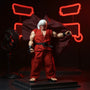 Miniature 1/12 scale wired cloth cape in dark red draped dynamically on a display stand against a neon arcade backdrop, with dramatic red rim lighting.