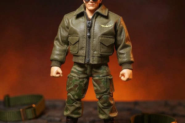 Miniature military uniform on battle-damaged diorama with dog tags and tactical belt