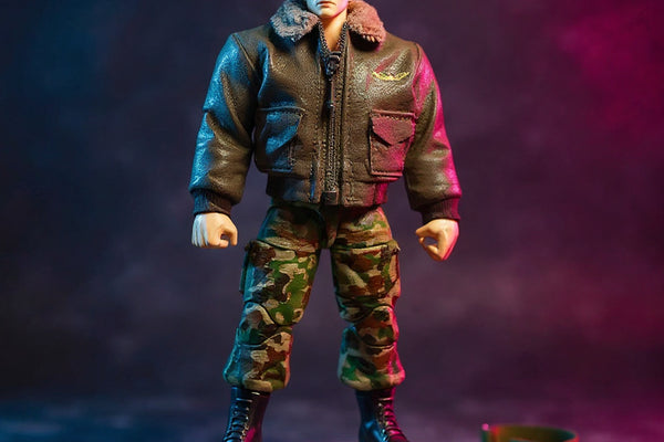 1/12 scale military khaki and olive green fabric uniform on invisible mannequin, with miniature dog tags and tactical belt on battle-damaged pavement, against bold blue-to-magenta gradient background.