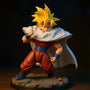Small fabric cape with wire hem draped on Gohan action figure on rocky diorama with Dragon Balls, dramatic lighting