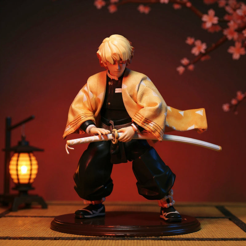 Soft fabric pale yellow haori with orange triangle pattern on a posable 12-inch action figure in a Japanese-themed scene with cherry blossoms and lantern.