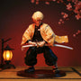 Soft fabric pale yellow haori with orange triangle pattern on a posable 12-inch action figure in a Japanese-themed scene with cherry blossoms and lantern.