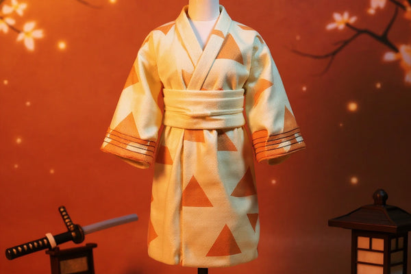 Pale yellow haori cloak with orange triangles on headless action figure torso, cherry blossom and Japanese lantern background