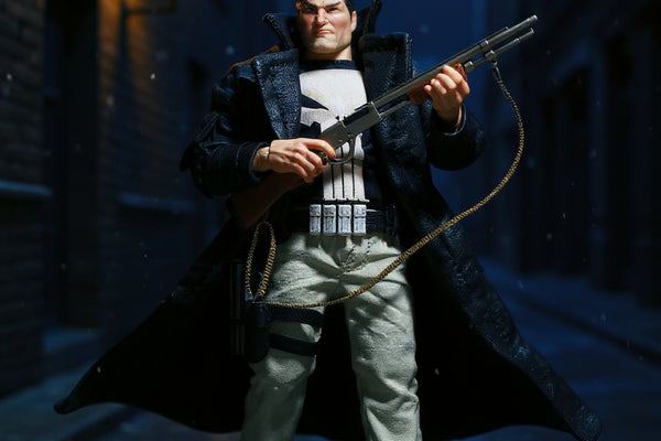 Black fabric trench coat with hand-stitching on action figure in dynamic pose under urban alley rain with street lamp