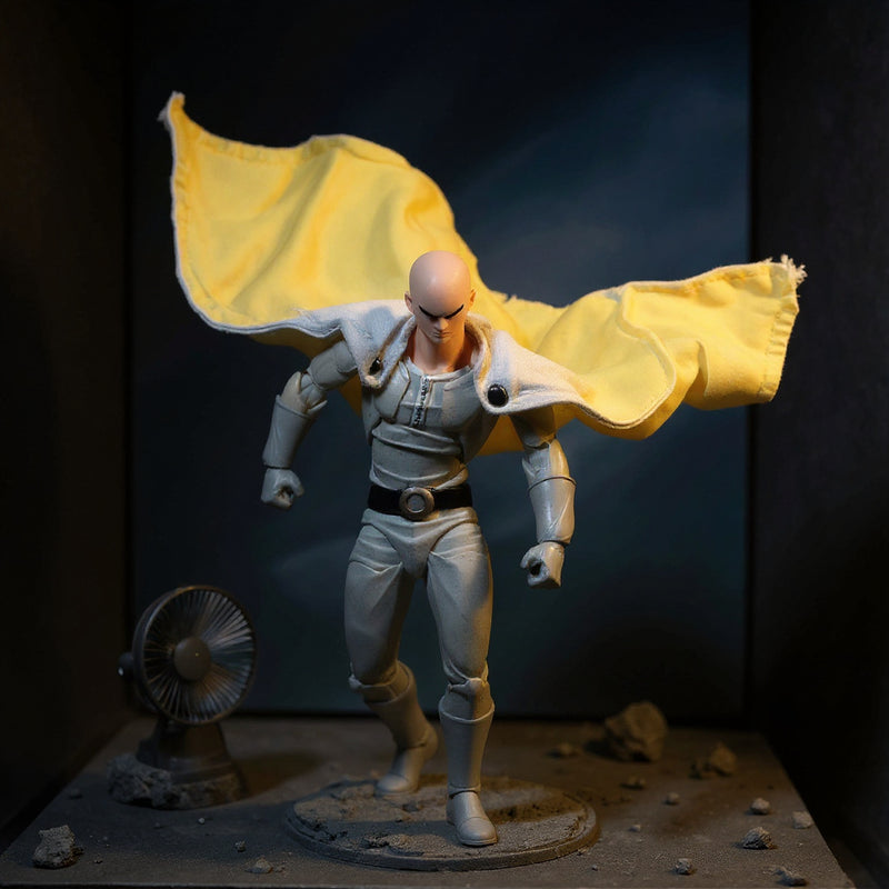 Yellow-and-white cloth cape on mannequin torso on urban rooftop diorama with wind effect and dramatic lighting.