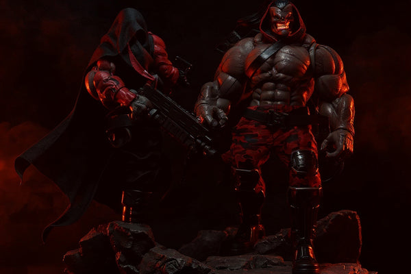 Black and deep-red flowing cloth cape with internal wire framing, hood attached, draped on a dark gothic cracked stone base with red LED lighting and smoke effects.