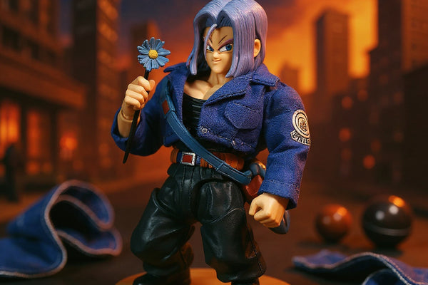 Miniature blue denim jacket for 1/12 action figure displayed on a wooden stand with denim swatches against a bold orange gradient and urban backdrop, showcasing visible stitching and wire-shaped sleeves.