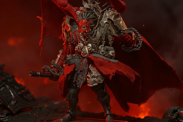 Dark crimson-red and bronze wired cloth cape for 1/18 scale figure displayed on a stand in a battlefield diorama with red and black lighting.