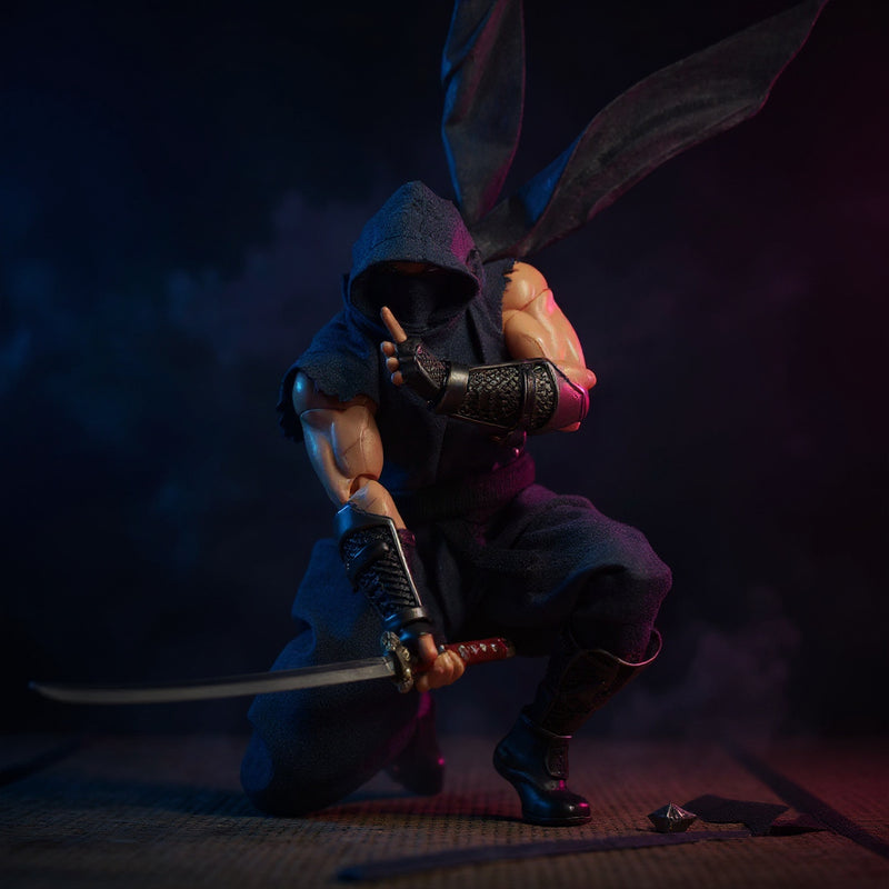 Dark ninja-style 1/12 scale action figure outfit in moonlit dojo with katana and fog.