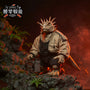 Ceratopsian dinosaur figure in textured fabric warrior outfit on rocky jungle diorama with dramatic side lighting.