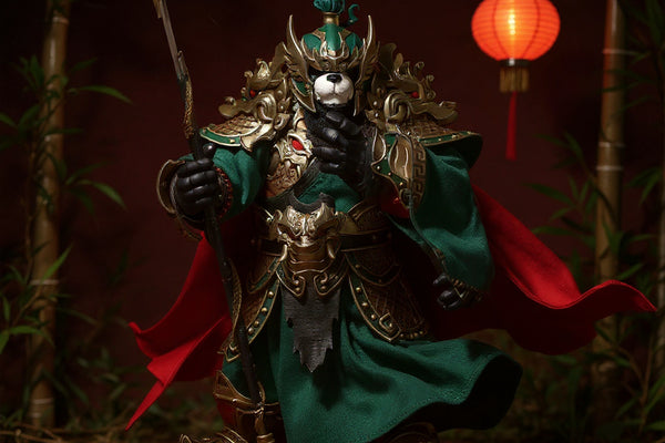 Red and black fabric cape on 7-inch action figure against bamboo forest and red lanterns