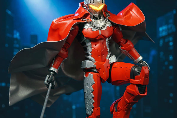 Ultraman Seven style figure wearing a dark fabric cape with internal wire frame, posed dynamically against a city skyline backdrop with dramatic spotlight and wind-blown cape effect.